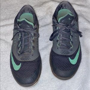 Grayish teal Nike running shoes